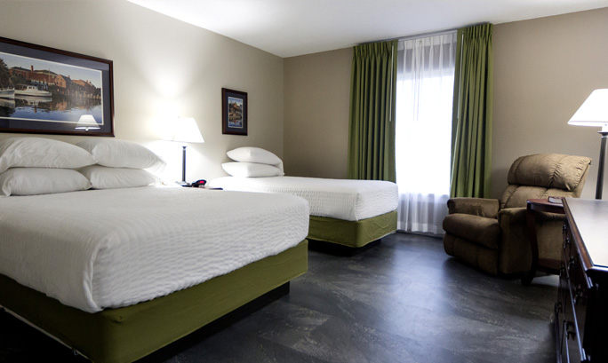 Comfortable bedroom, tastefully decorated.